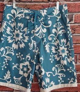 BLUE CURL SWIM TRUNKS